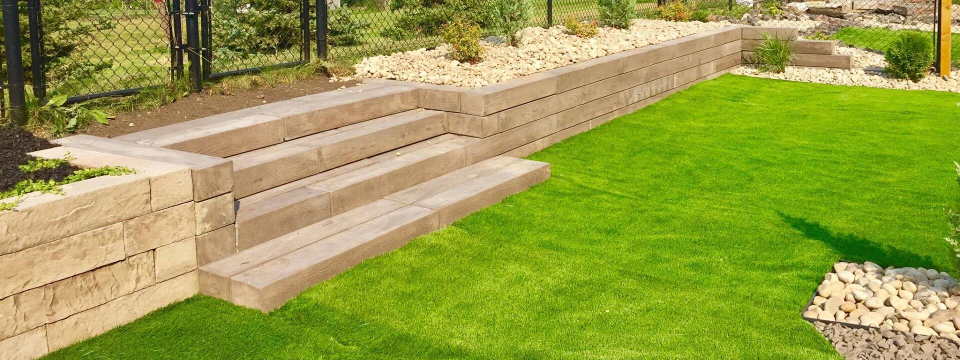 Image of landscaped yard during day time.